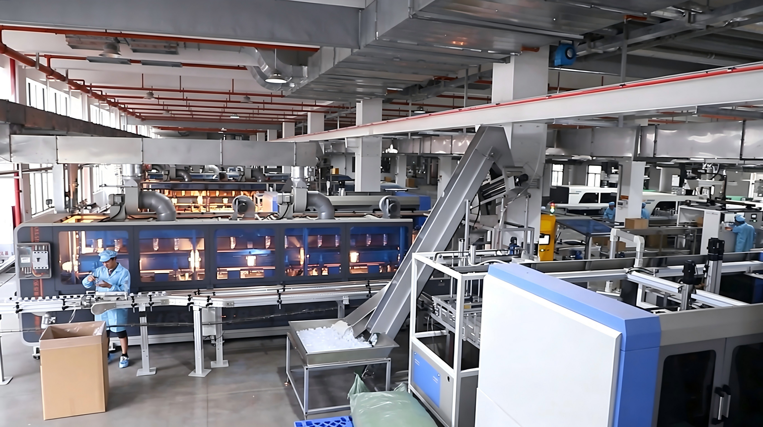 High-tech manufacturing facility producing custom glass and plastic bottles in a modern industrial s.