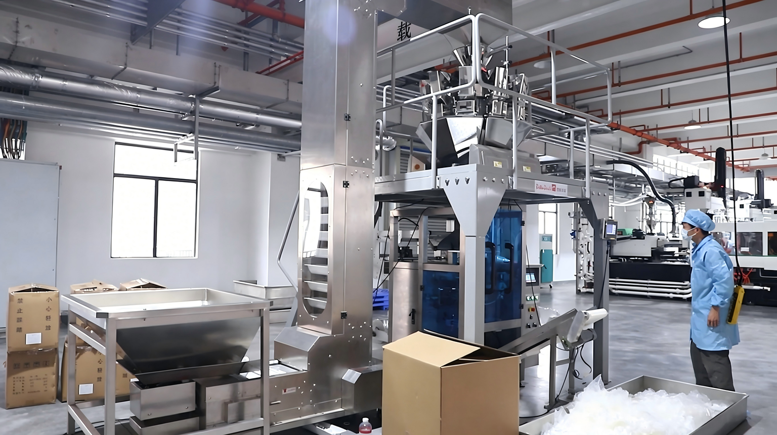Modern plastic and glass container manufacturing machinery in a clean factory setting.