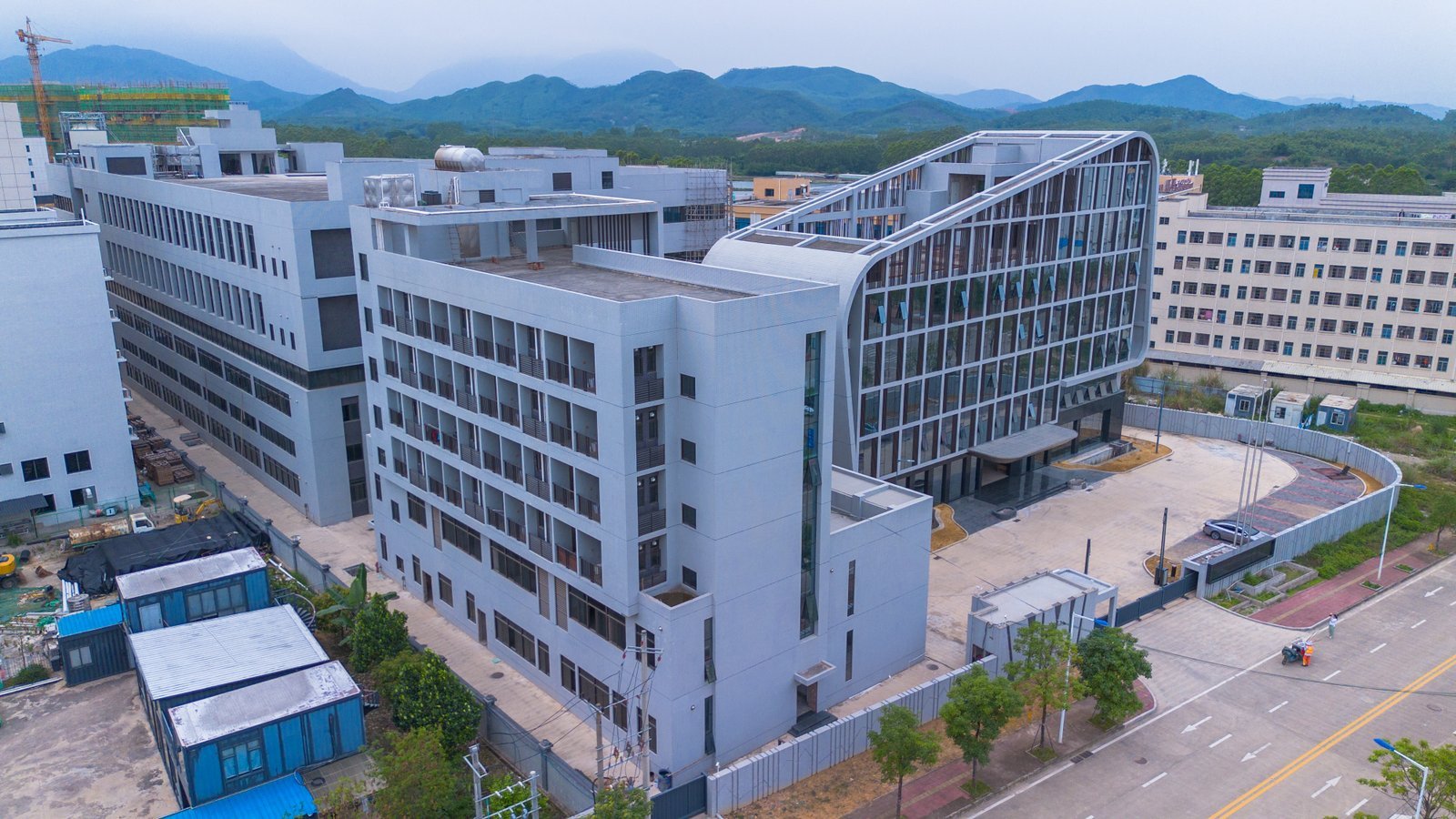 Modern manufacturing plant with glass and plastic containers production lines.