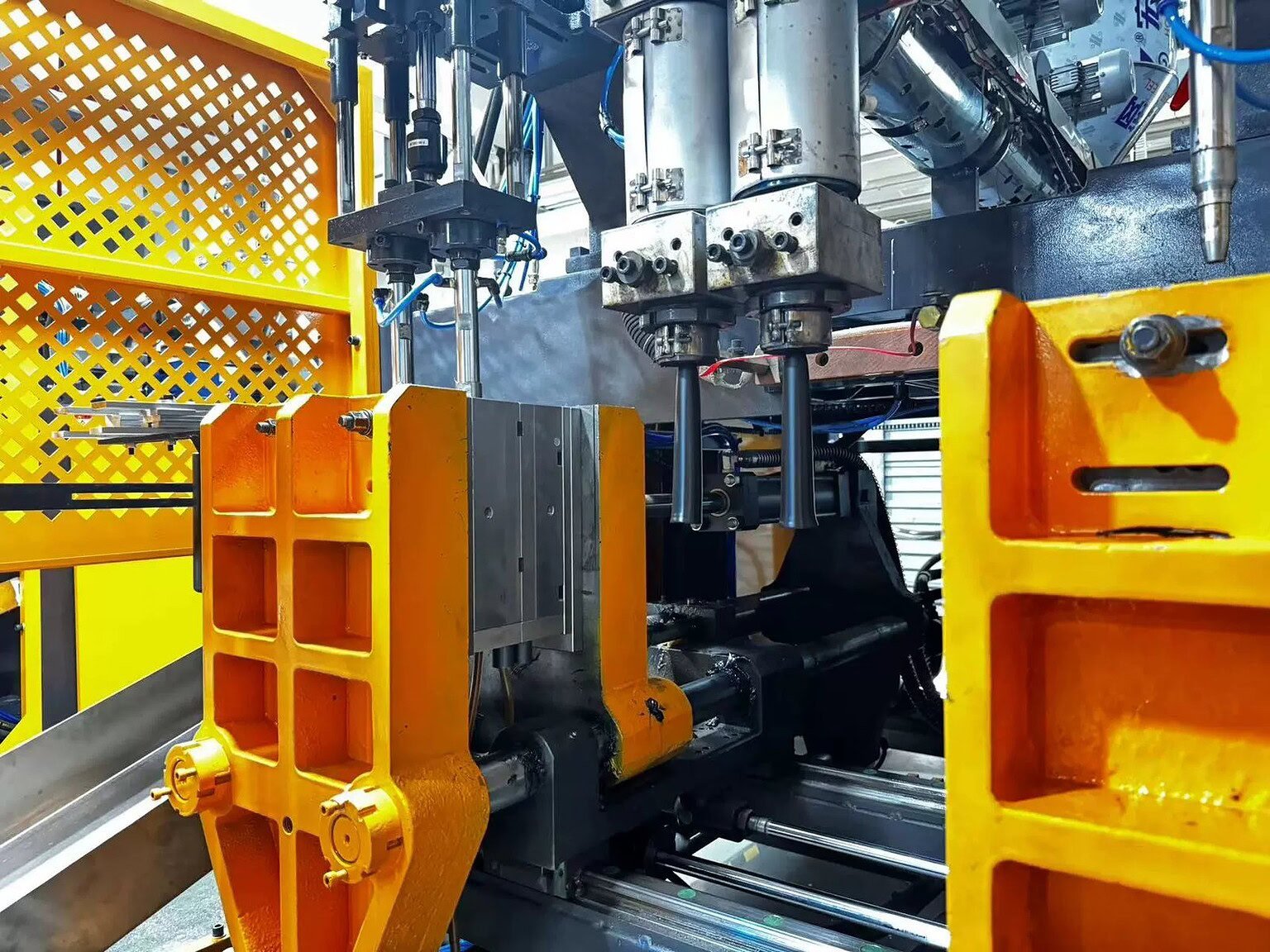 Industrial plastic container manufacturing machinery.