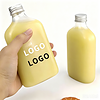 Juice bottles with customizable logos and labels, 8oz or 12oz capacity.