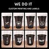 Custom printed black plastic cups with various logos and designs for beverages.