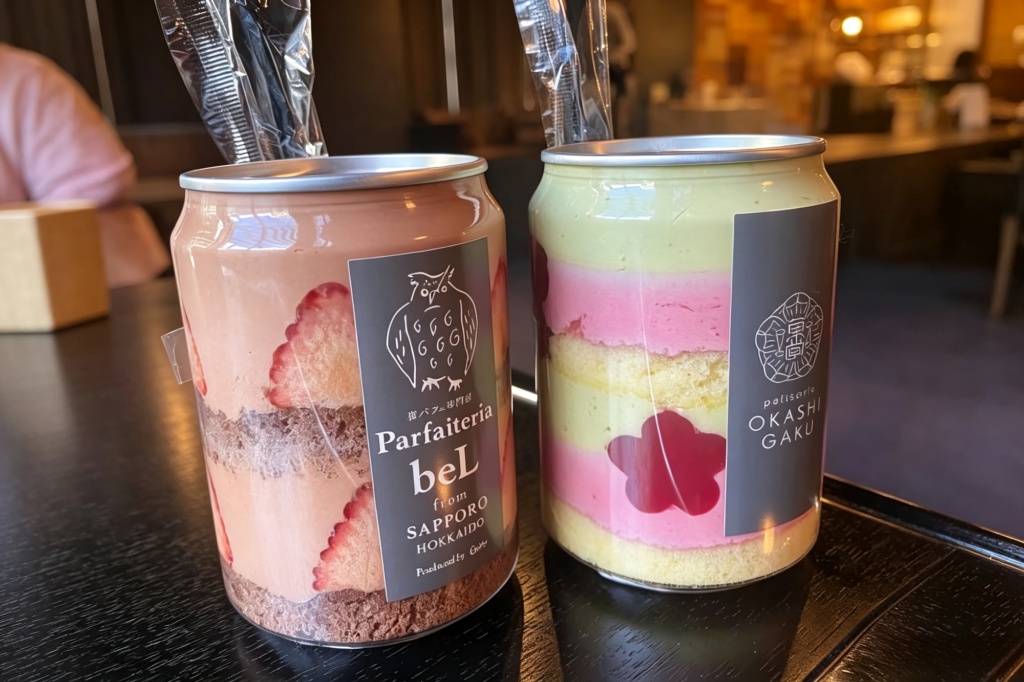 Custom decorated cans with colorful designs for beverages or desserts.