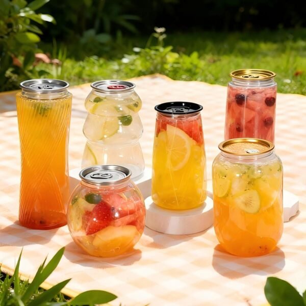 Clear PET soda cans with pop‑top easy open lids.
