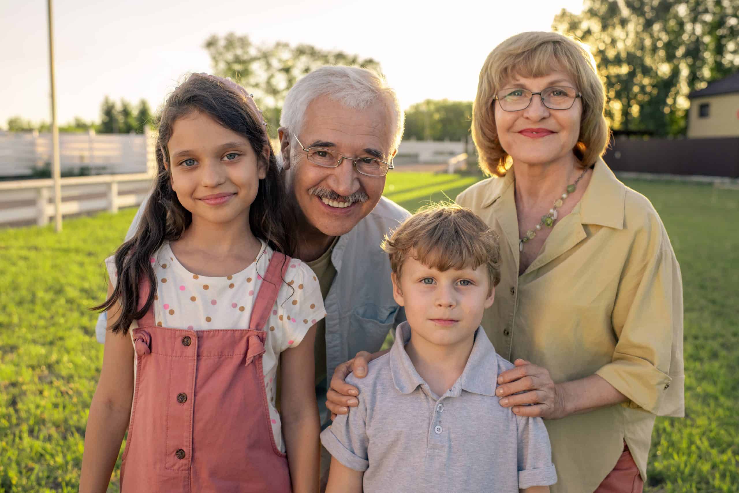 Happy family with grandparents and children outdoors in Texas.