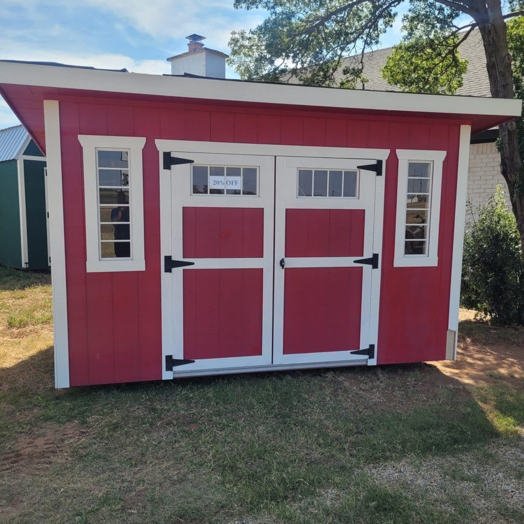 Red 8x12 studio shed featuring large front windows, white trim, and a clean modern design.