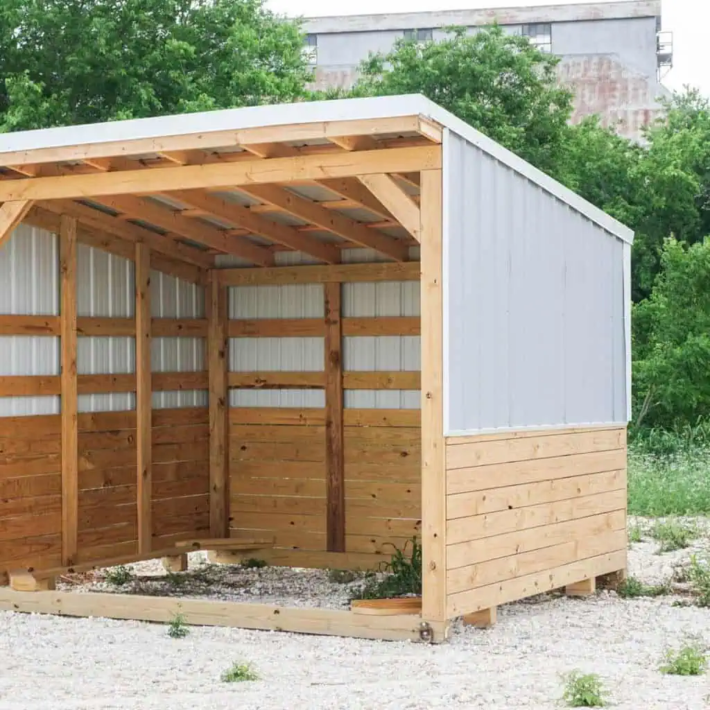 Wooden loafing shed ideal for Texas farms and ranches.