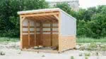 Wooden loafing shed ideal for Texas farms and ranches.