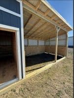 Newly built outdoor loafing shed for livestock in Texas.