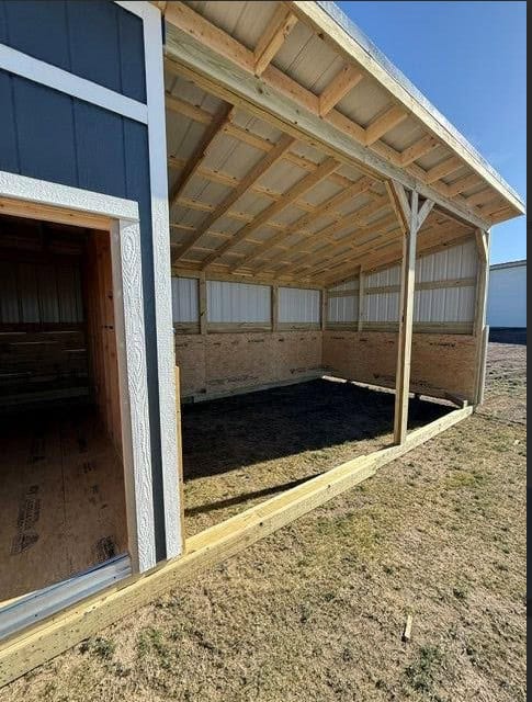 Newly built outdoor loafing shed for livestock in Texas.