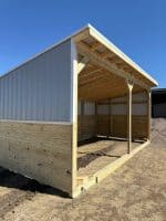 Wooden loafing shed ideal for Texas farms and ranches.