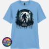 Bigfoot Doesn't Believe in You Either moonlit forest design on unisex T-shirt baby blue - Print Unleashed