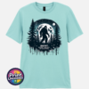 Bigfoot Doesn't Believe in You Either moonlit forest design on unisex T-shirt teal ice - Print Unleashed