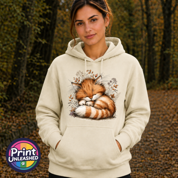 Copper Catnap sleeping ginger cat autumn design on Softstyle hoodie model - Print Unleashed
