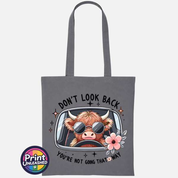 Don't Look Back Highland cow design on cotton tote bag graphite - Print Unleashed