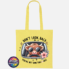 Don't Look Back Highland cow design on cotton tote bag lemon - Print Unleashed
