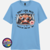 Don't Look Back Highland cow design on baby blue unisex T-shirt - Print Unleashed