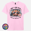 Don't Look Back Highland cow design on light pink unisex T-shirt - Print Unleashed