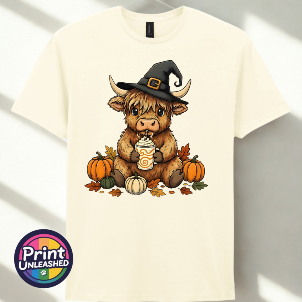 Highland Cow Witch off white Highland Cow Witch with pumpkins and autumn drink on unisex T-shirt off white - Print Unleashed