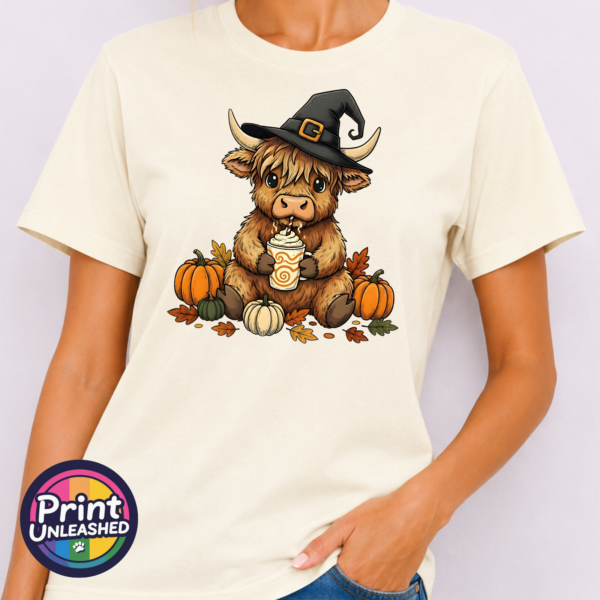 Highland Cow Witch off white model Highland Cow Witch with pumpkins and autumn drink on unisex T-shirt off white model - Print Unleashed