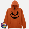 Scowling pumpkin face with arched eyebrows and a jagged grin on a Texas Orange Softstyle Hoodie - Print Unleashed