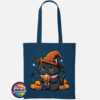 Cute black cat wearing an orange witch hat and pink collar, holding a steaming pumpkin mug among pumpkins, tiny ghosts and bats, printed on a tote bag petrol - Print Unleashed