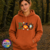 Halloween BOO design with tangled vines, a witch-hat pumpkin, ghosts and a spooky tree printed on a texas orange softstyle hoodie model image - Print Unleashed