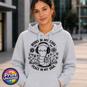 Smiling bookworm wearing headphones among flowers, with Books in My Ears Peace in My Soul wording, printed on an Everyday Hoodie heather grey model - Print Unleashed
