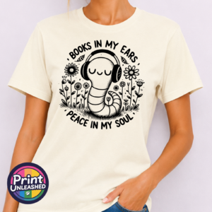 Smiling bookworm wearing headphones among flowers, with Books in My Ears Peace in My Soul wording, printed on a unisex T-shirt model - Print Unleashed