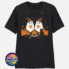 Two ghosts in witch hats holding orange mugs beside a campfire, with a black cat, pumpkins and autumn trees, printed on a unisex T-shirt black - Print Unleashed