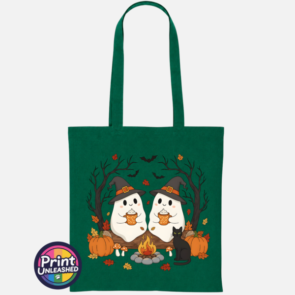 Camping Ghosts bottle green Two ghosts in witch hats holding orange mugs beside a campfire, with a black cat, pumpkins and autumn trees, printed on a tote bag bottle green - Print Unleashed