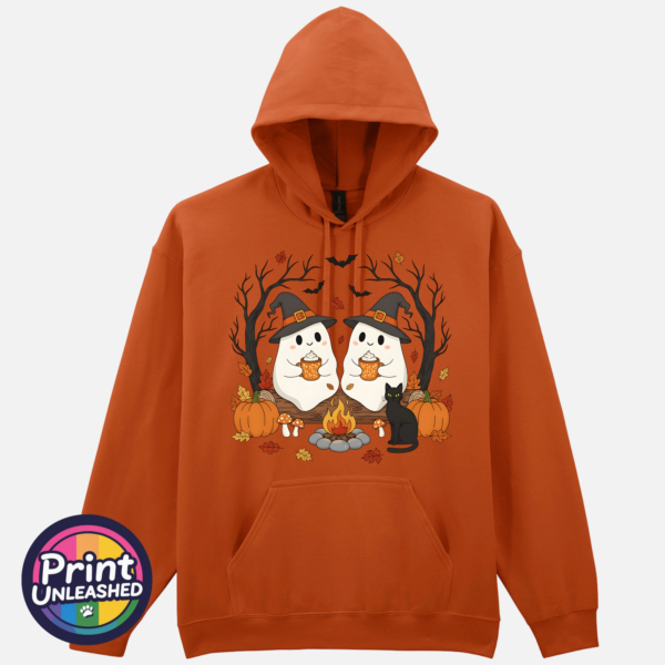 Camping Ghosts tex ora Two ghosts in witch hats holding orange mugs beside a campfire, with a black cat, pumpkins and autumn trees, printed on a softstyle hoodie texas orange - Print Unleashed
