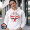 Vintage Kringle Candy Co. candy cane sign with ornate red lettering, crossed candy canes and a five-cent emblem, printed on a white unisex hoodie female model - Print Unleashed