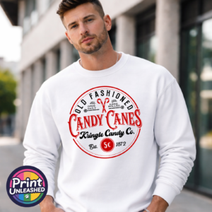 Vintage Kringle Candy Co. candy cane sign with ornate red lettering, crossed candy canes and a five-cent emblem, printed on a white unisex sweatshirt male model - Print Unleashed