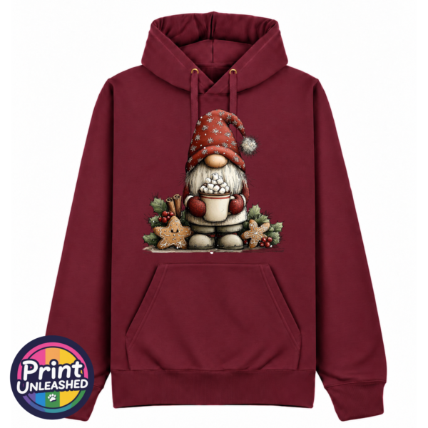Classic Gonk Hot Choc pepper red Classic Hoodie in pepper red featuring a Christmas gonk in a red snowflake hat holding hot chocolate piled with marshmallows, surrounded by gingerbread stars and holly - Print Unleashed