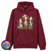 Three Christmas cows tangled in colourful lights, one wearing a Santa hat and another holding a candy cane, printed on a classic hoodie in pepper red - Print Unleashed