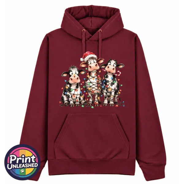 Three Christmas cows tangled in colourful lights, one wearing a Santa hat and another holding a candy cane, printed on a classic hoodie in pepper red - Print Unleashed