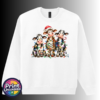 Three wide-eyed Christmas cows tangled in colourful lights, one wearing a Santa hat and another holding a candy cane, printed on a white unisex sweatshirt - Print Unleashed