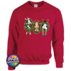 Three Christmas cows in festive wreaths, one wearing a Santa hat and another facing backwards with antlers and striped leg warmers, printed on a cherry red unisex sweatshirt - Print Unleashed
