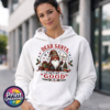 Christmas gonk holding an I Tried sign beside presents and a small tree, with Dear Santa Define Good wording, printed on a white unisex hoodie female model - Print Unleashed