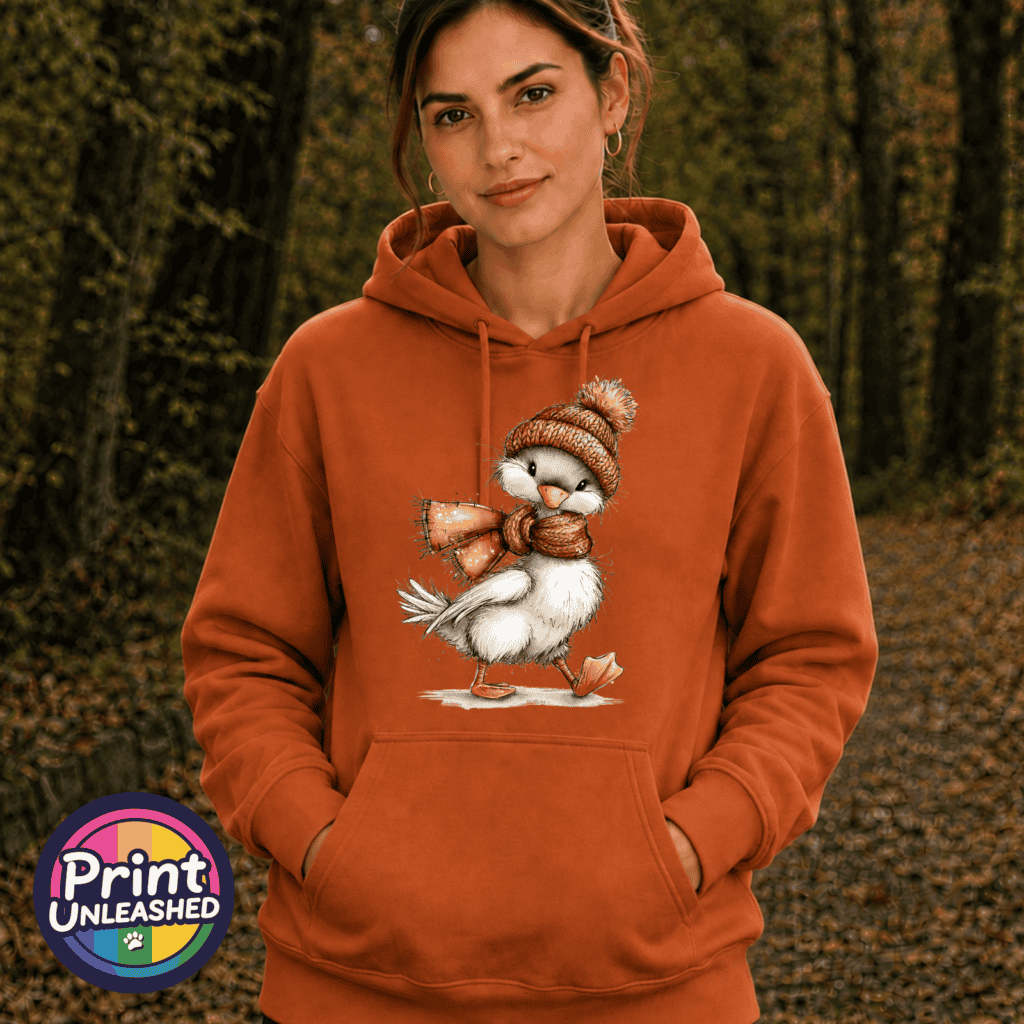 Duck wearing a copper-orange bobble hat and scarf on a softstyle hoodie model - Print Unleashed