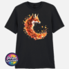 Fox in profile with its russet fur blending into a sweeping curve of orange, red and golden autumn leaves printed on a unisex T-shirt black - Print Unleashed