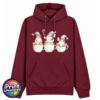 Classic Hoodie in pepper red featuring three Christmas gonks sitting on cream speckled cups, wearing grey festive hats with red details and holding sweet treats - Print Unleashed