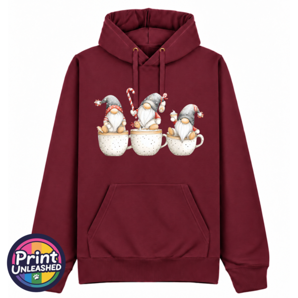 Gonk Cups pepper red Classic Hoodie in pepper red featuring three Christmas gonks sitting on cream speckled cups, wearing grey festive hats with red details and holding sweet treats - Print Unleashed