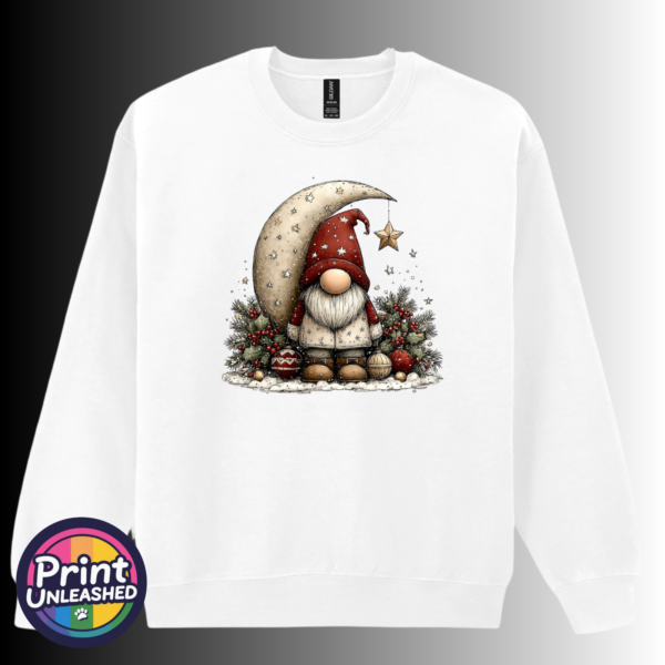 Christmas gonk in a red star-patterned hat beside a cream crescent moon and hanging gold star, with holly and baubles, printed on a white unisex sweatshirt - Print Unleashed