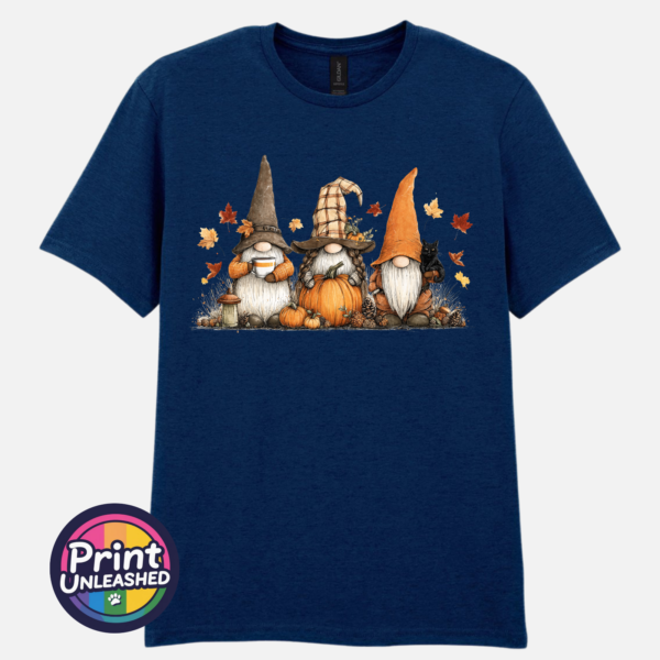 Three autumn gonks in witch hats with pumpkins, a takeaway cup, a black cat and falling leaves printed on a unisex T-shirt navy - Print Unleashed