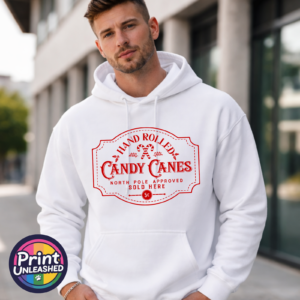 Vintage red Hand Rolled Candy Canes sign with crossed candy canes, holly, North Pole Approved wording and a five-cent emblem, printed on a white unisex hoodie male model - Print Unleashed