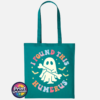 Cute ghost holding a bone beneath colourful I Found This Humerus lettering, surrounded by bats and stars, printed on a jade tote bag - Print Unleashed