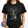 Model image of unisex T-shirt featuring a dancing skeleton with bats, a crescent moon, stars, a cat and ghost beneath Just a Little Ray of Pitch Black lettering - Print Unleashed
