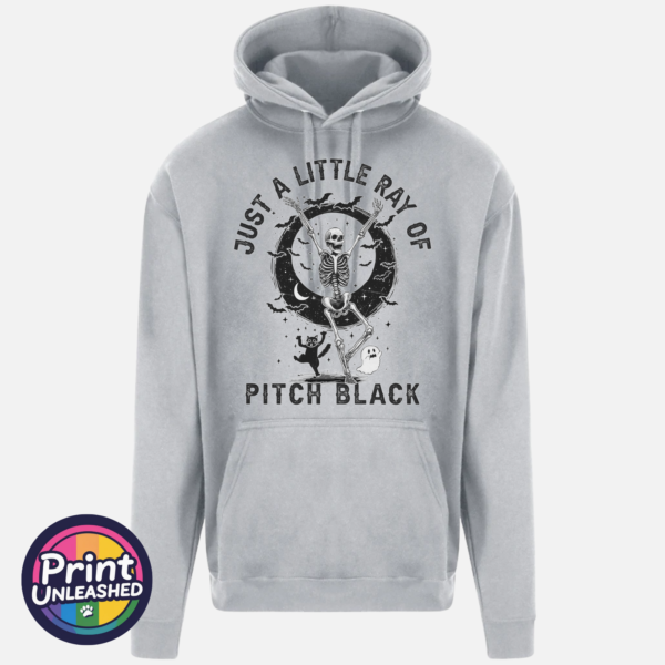 Just A Little Ray heather grey Heather grey everyday hoodie featuring a dancing skeleton surrounded by bats, stars, a crescent moon, a cat and ghost with Just a Little Ray of Pitch Black lettering - Print Unleashed